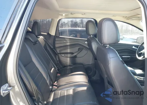 2016 Ford Escape Titanium z USA, uszkodzony, nr VIN 1FMCU9J93GUB67325